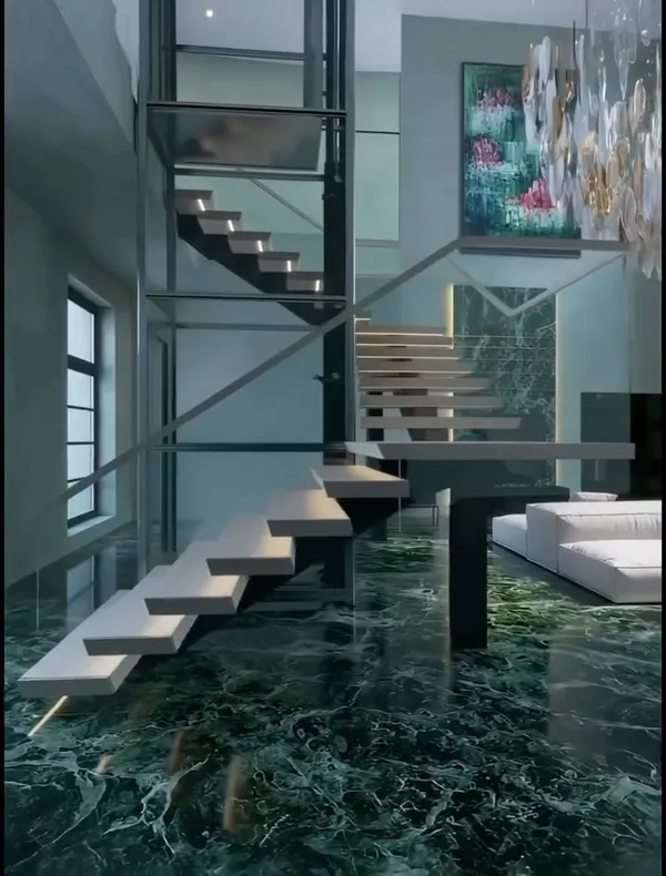 Laser-cut steel floating stairs in a double-height loft space